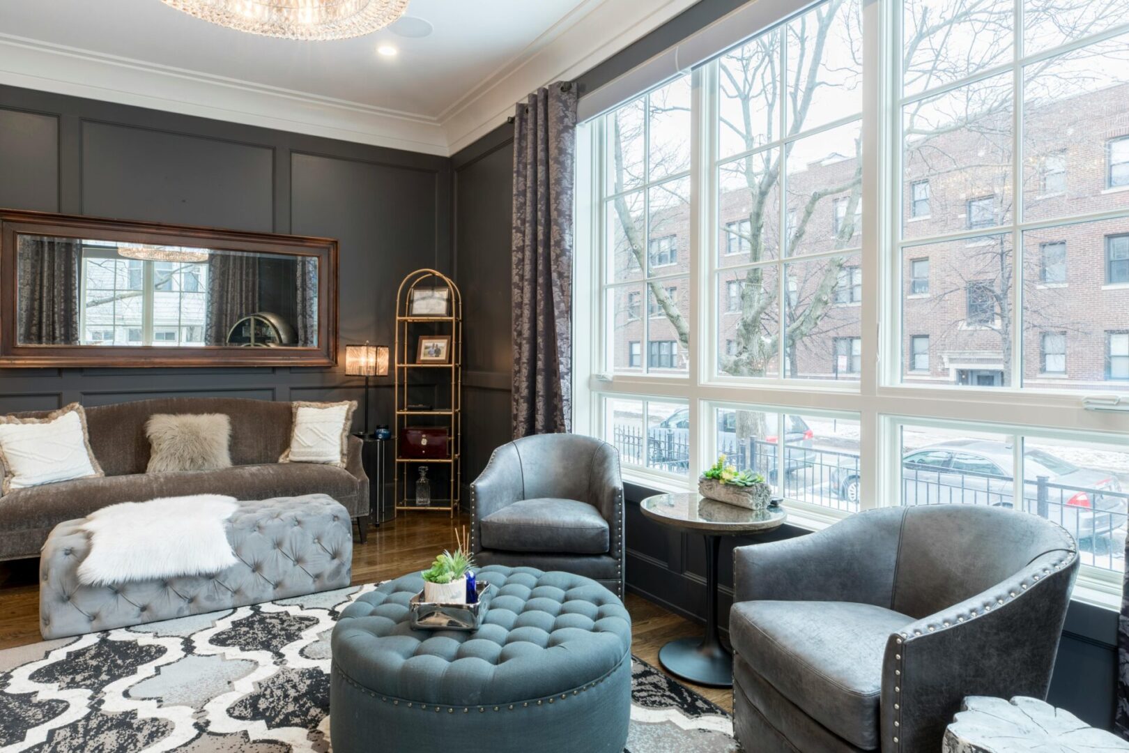 A living room with two chairs and a table